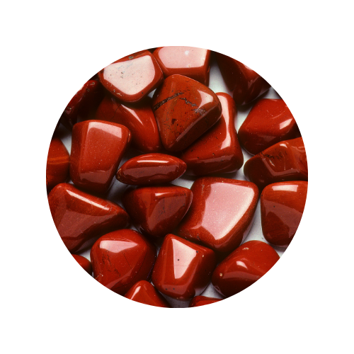 An assortment of red stones on a white background