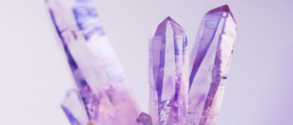 Amethyst crystal with a soft focus background